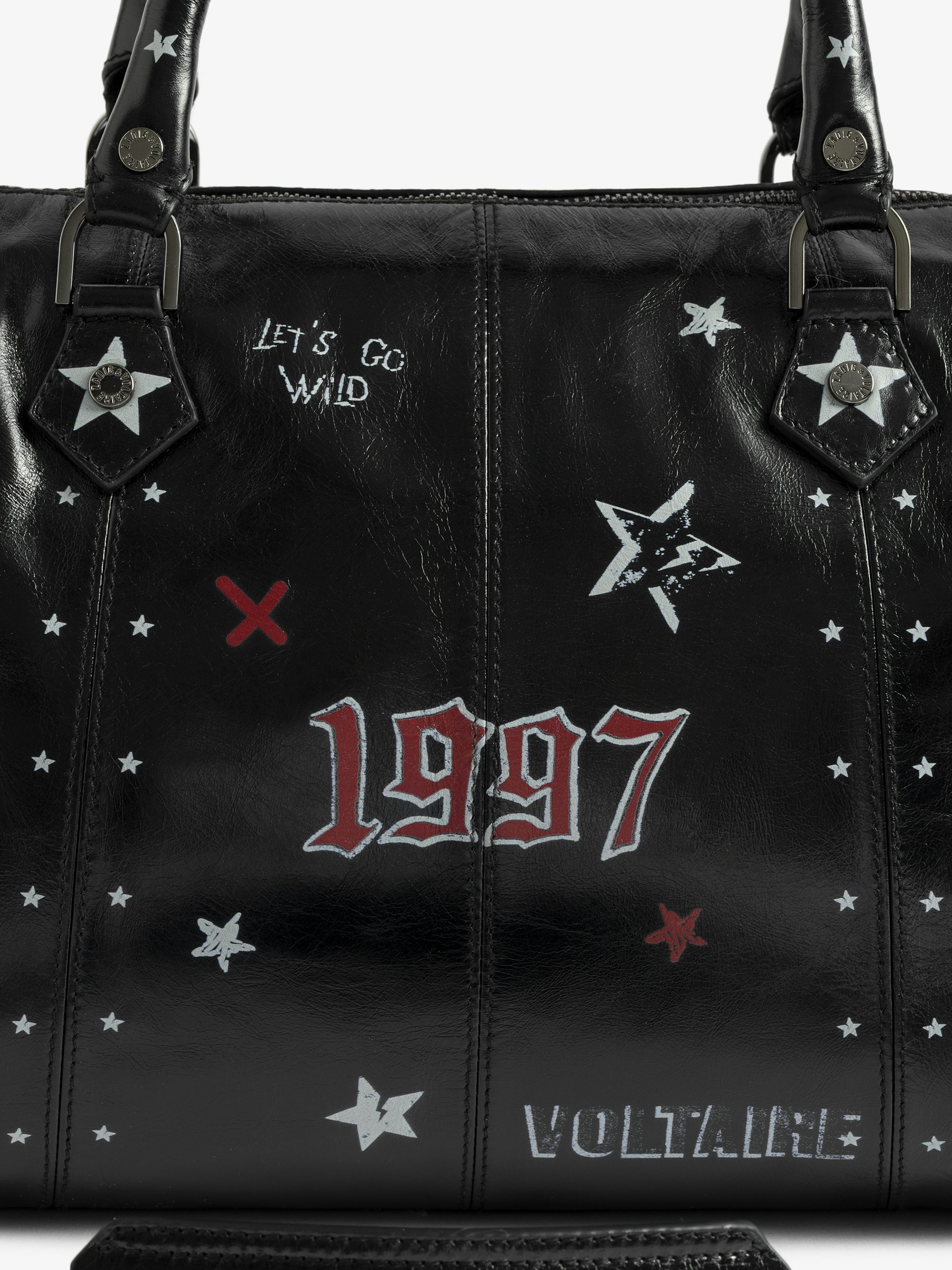 Sunny Medium Vibe Punk Bag - Patent leather effect bag with vintage-inspired punk tag, adjustable shoulder strap and wings signature.